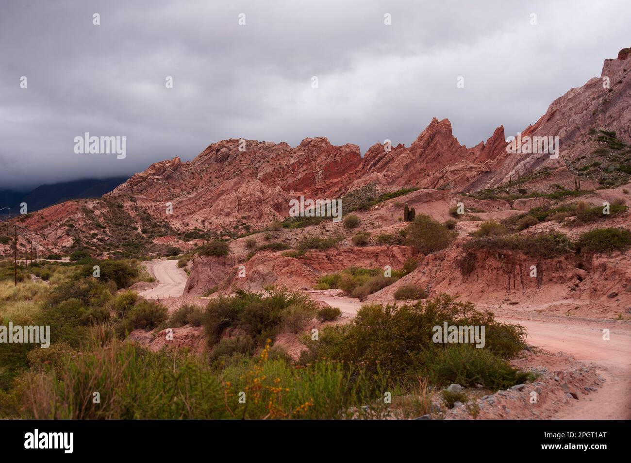 Red rock formations near Pueblo Viejo village near La Poma on the Ruta 40, Salta Province, Argentina Stock Photo