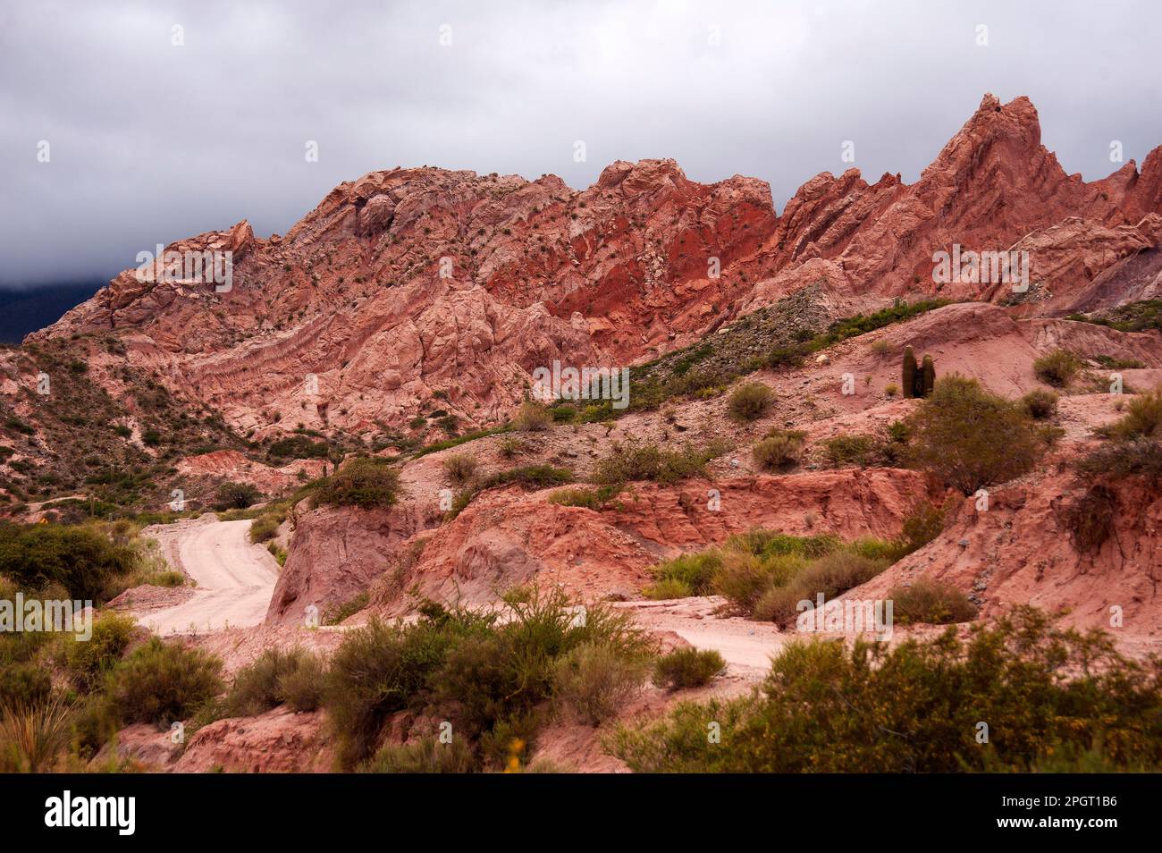Red rock formations near Pueblo Viejo village near La Poma on the Ruta 40, Salta Province, Argentina Stock Photo