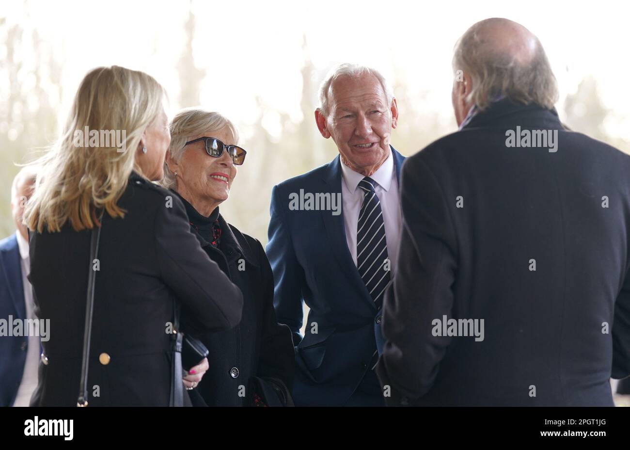 Bob Wilson (centre) arrives ahead of a funeral service for sport
