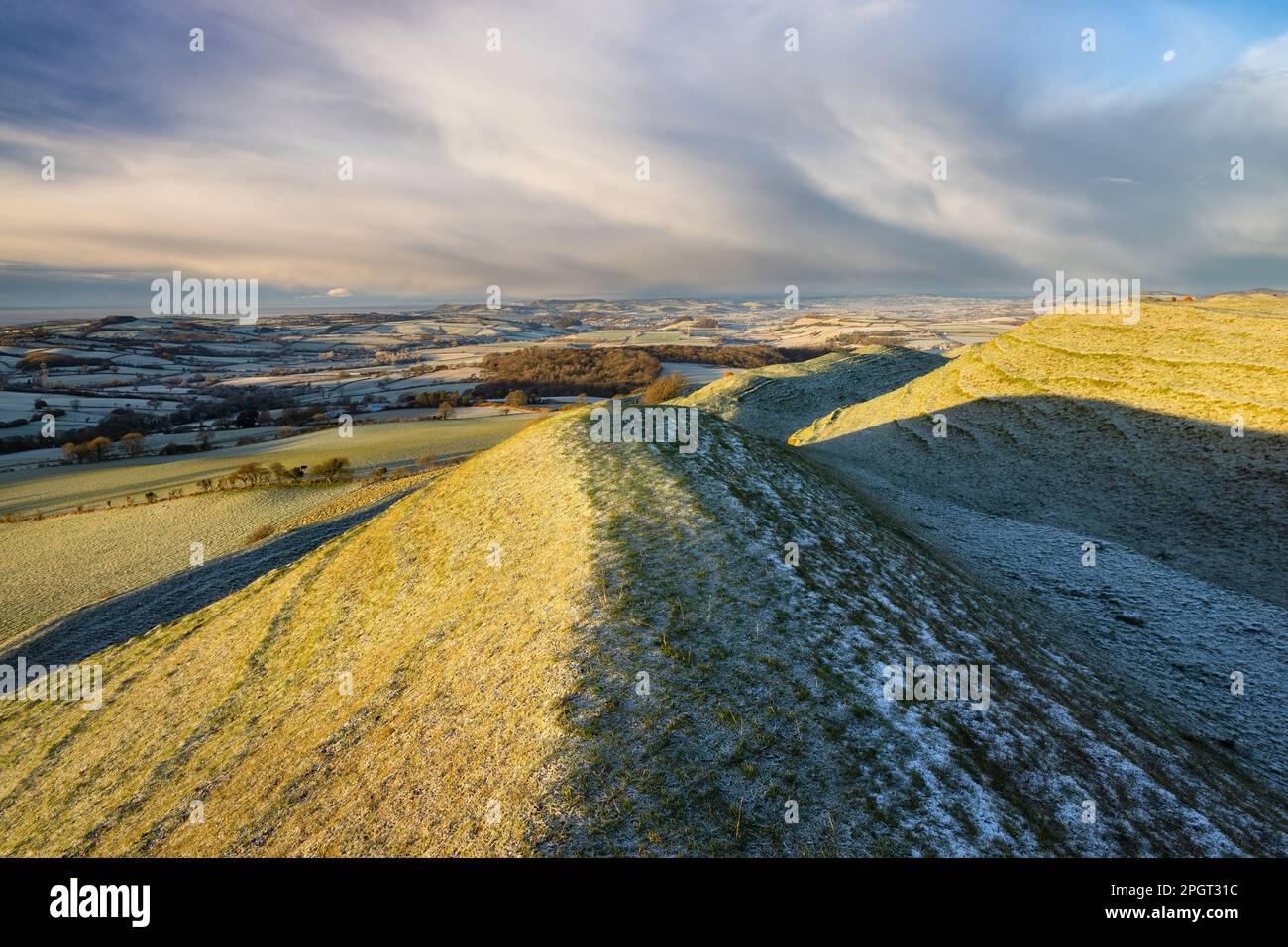 Eggardon Hill (Iron-age hill fort) on a frosty winter morning, Dorset, England, UK Stock Photo