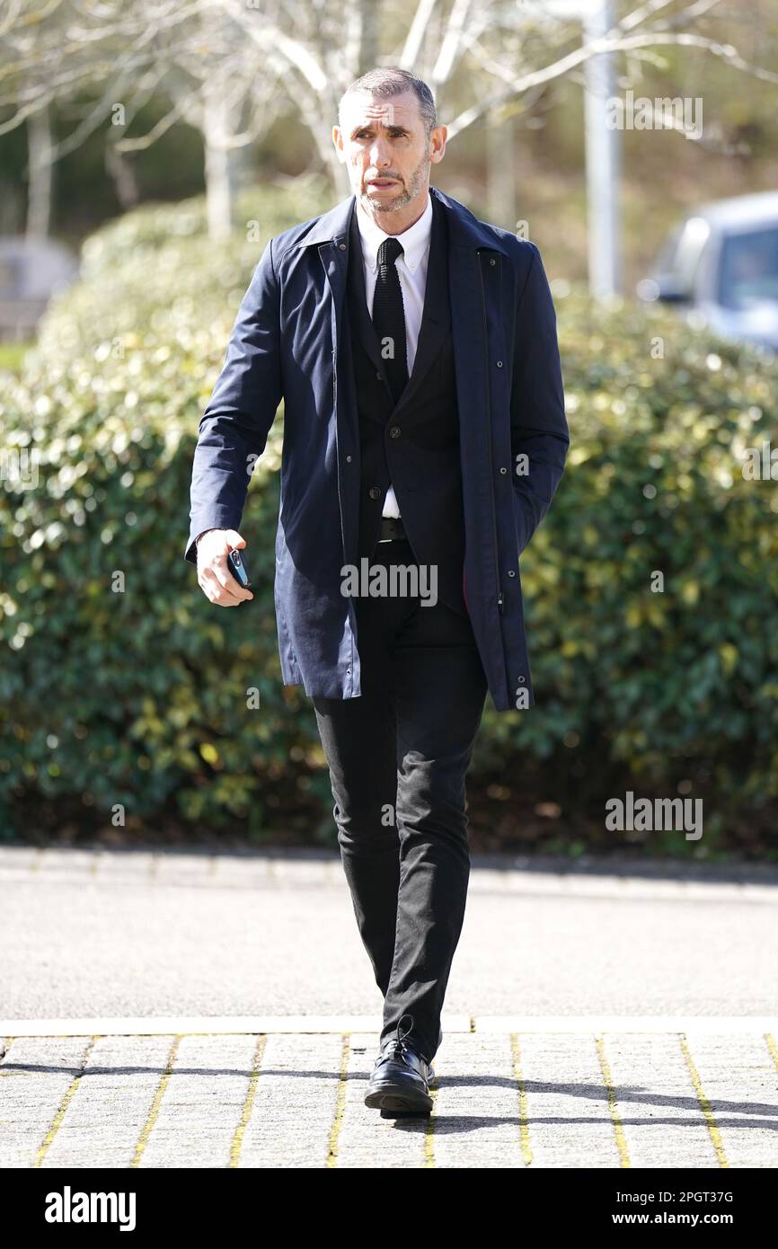 Martin Keown arrives ahead of a funeral service for sport commentator