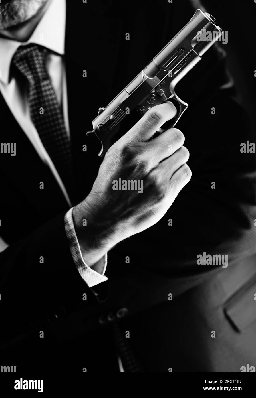 Well dressed male secret agent detective spy wearing suit and tie