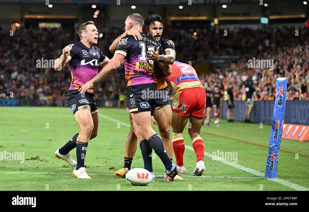 Jesse Arthars Rtry Kurt Capewell (centre) of the Broncos celebrates scoring a try with ...