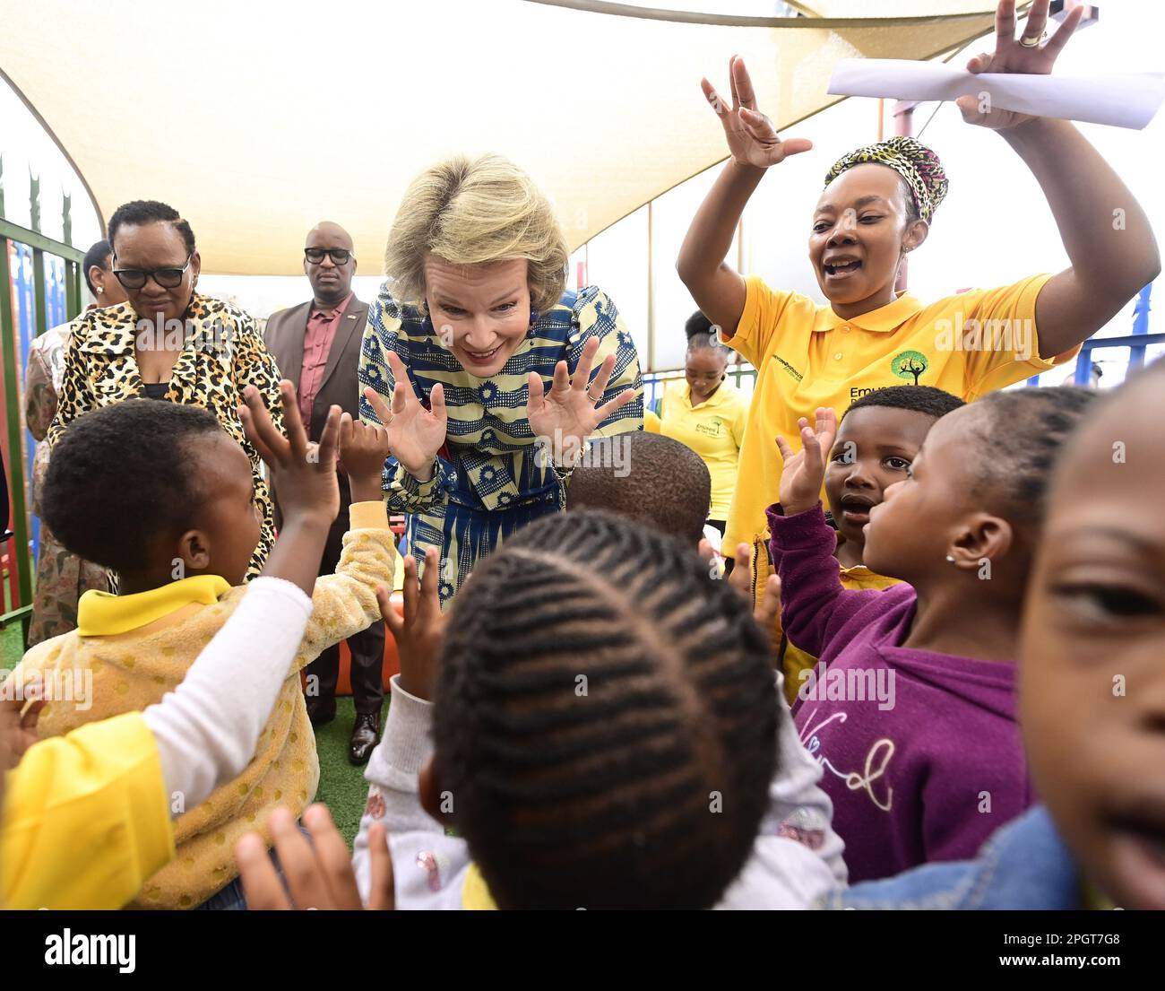 Johannesburg, South Africa. 24th Mar, 2023. Queen Mathilde of Belgium meets  children during a visit of the Emuseni day Care Centre, in Johannesburg,  during a state visit of the Belgian Royal Couple