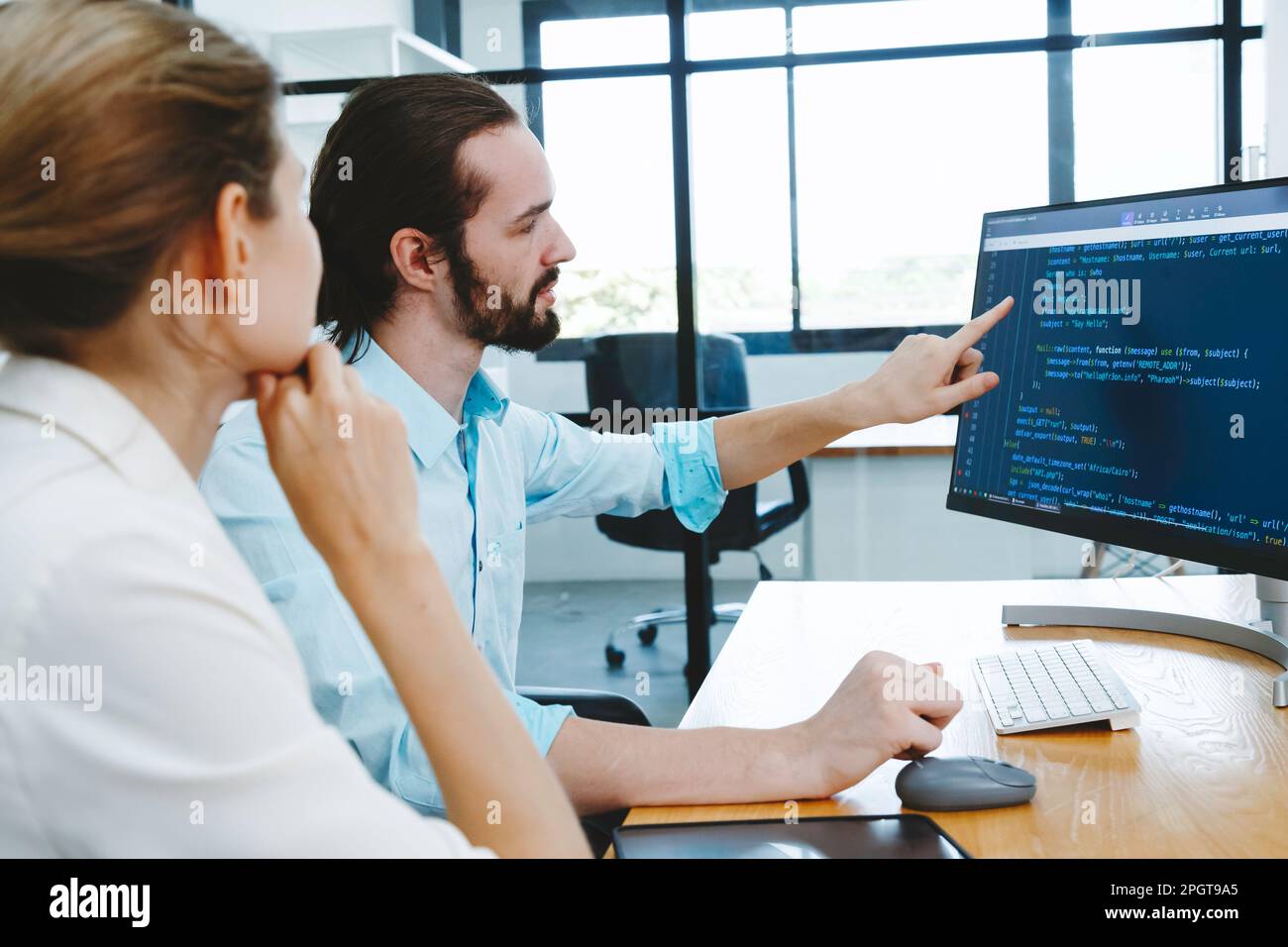 Professional development programers programming game software or developing code for shopping online financial data security system network working at Stock Photo