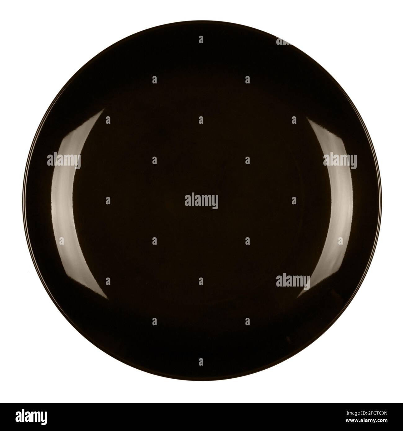 Single ceramic black plate isolated on white background Stock Photo Alamy