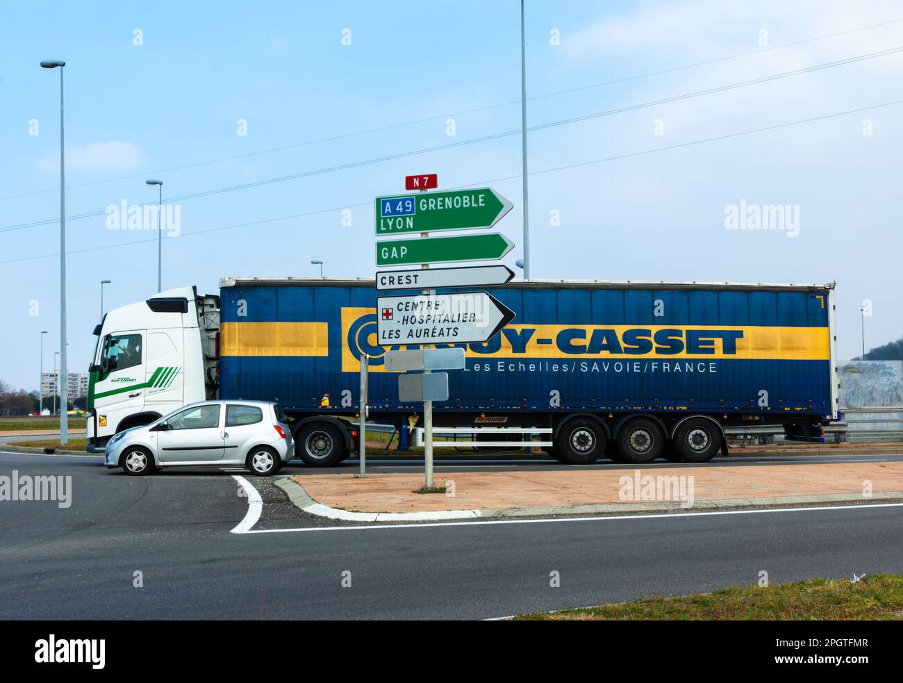Valence, France March 3, 2023 A truck and a car in front of the