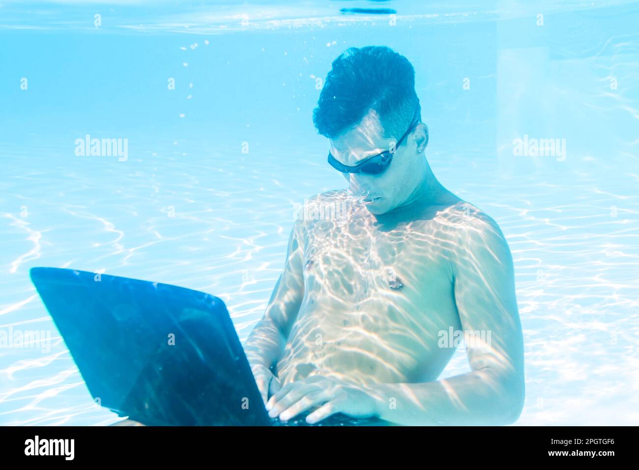 Man fishing using laptop on hi-res stock photography and images - Alamy