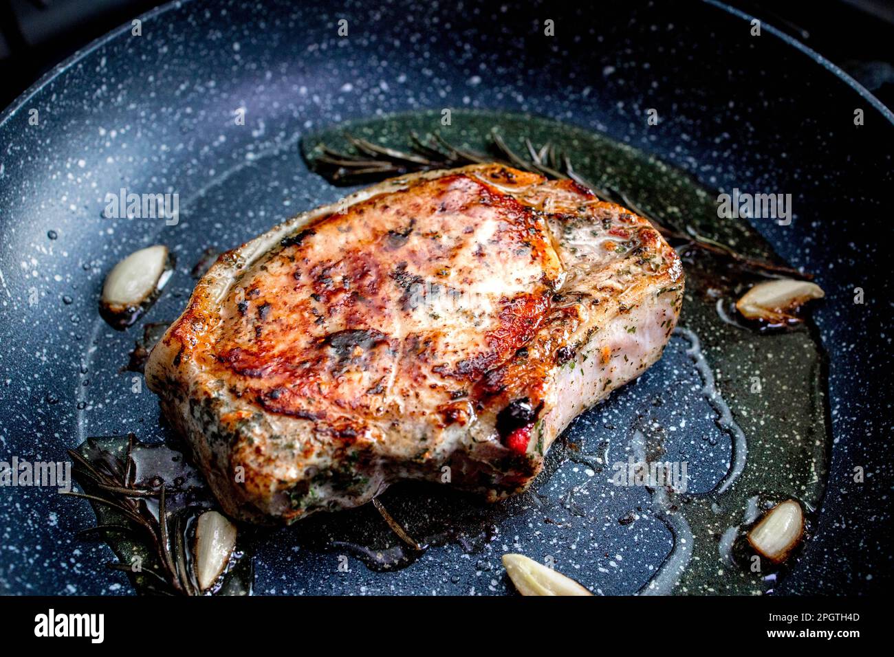 Grilled premium rib eye beef steak in the pan, cooking steak in the