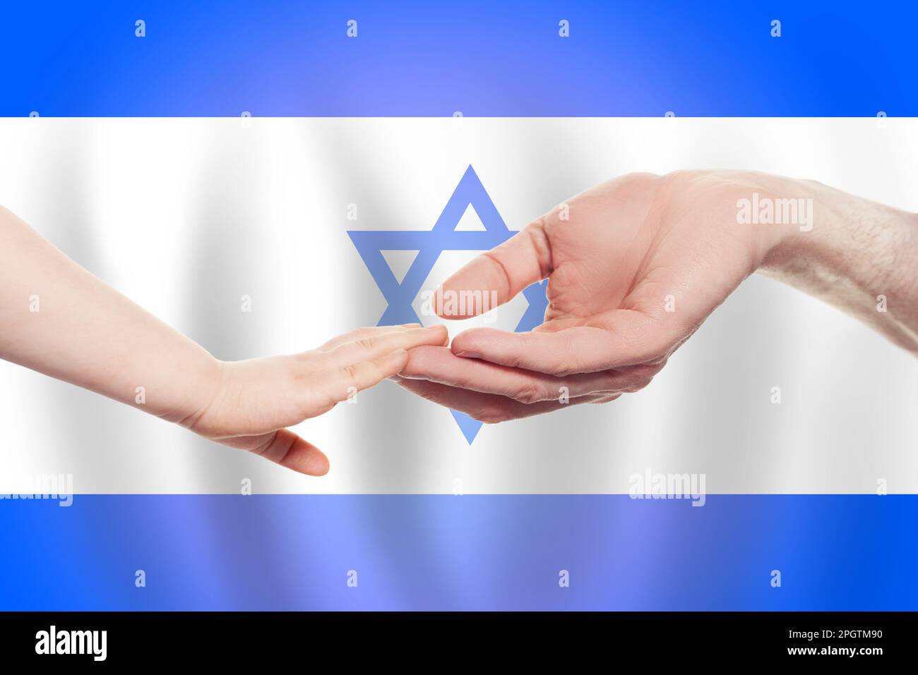 Izraeli baby and parent hands on the background of flag of Izrael Help, aid, support, charity concept Stock Photo