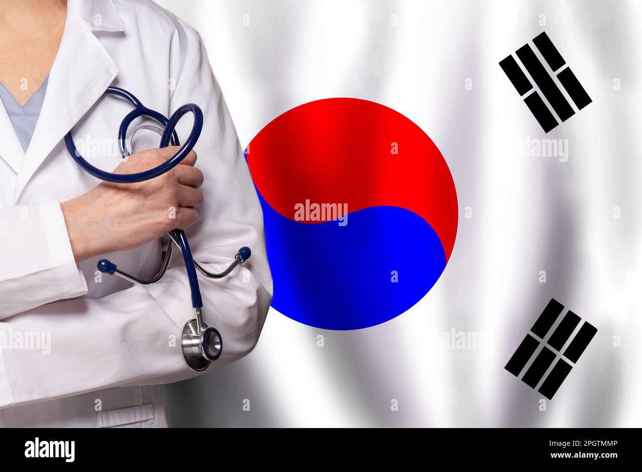 Korean medicine and healthcare concept. Doctor close up against flag of Korea background Stock Photo