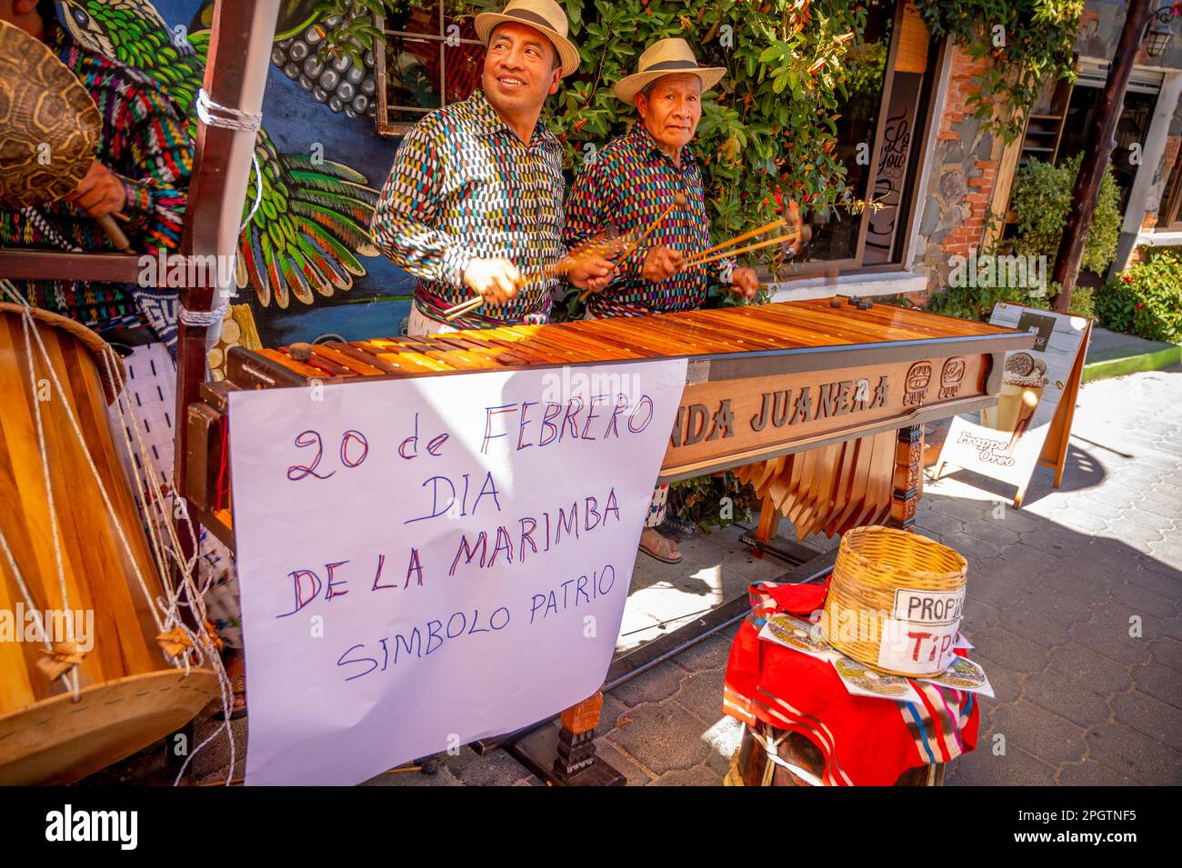 Guatemalan men playing the Marimba in San Juan la Laguna Guatemala