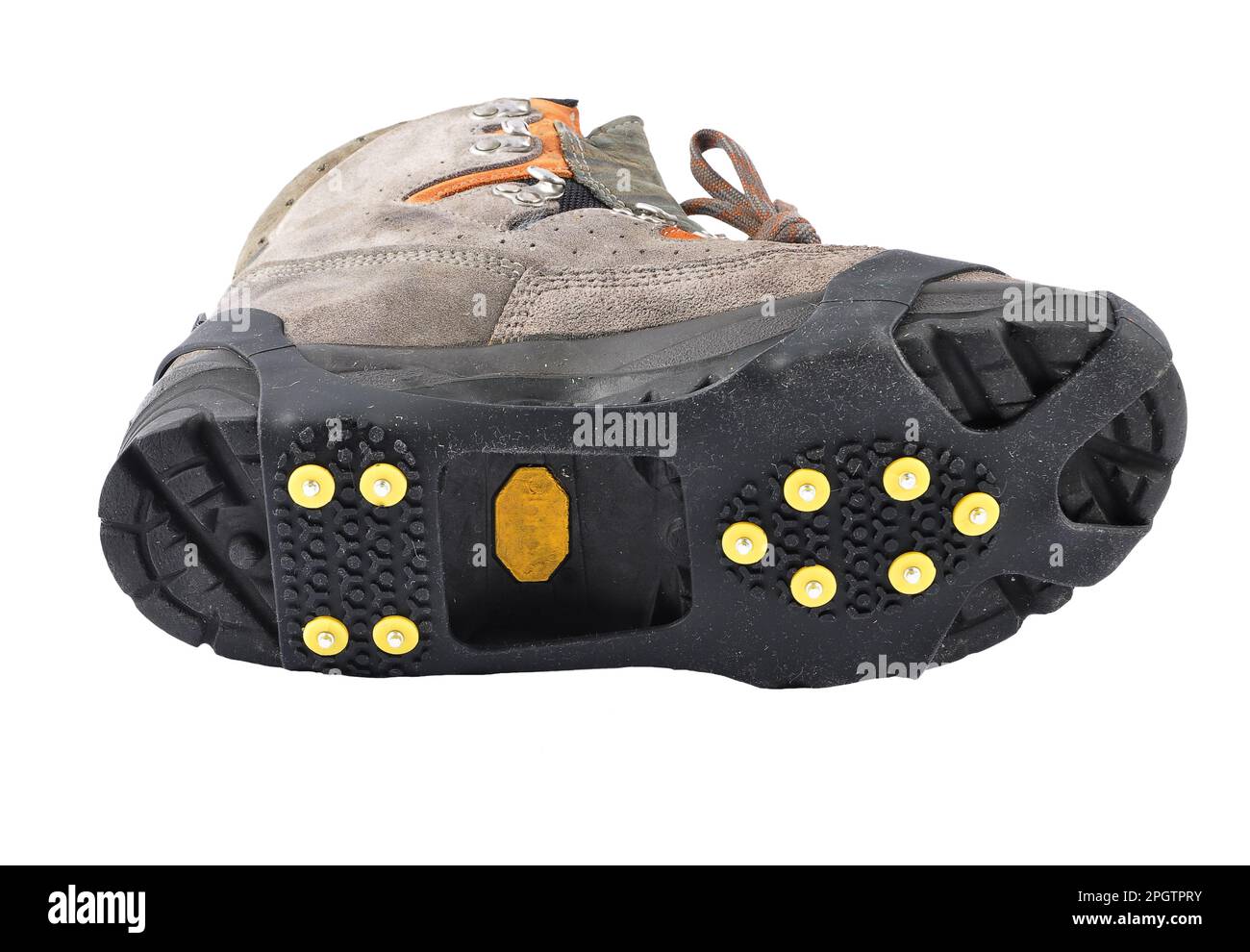 Hiking shoes with spikes on a white background Stock Photo Alamy