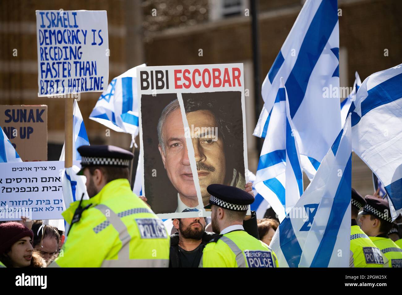 A placard comparing Israeli PM Benjamin Netanyahu to Colombian drug ...
