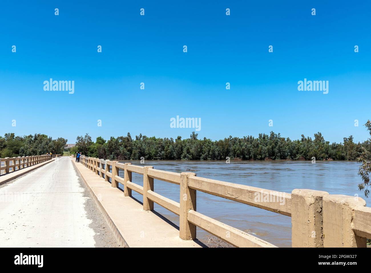 The road bridge over a flooded Orange River at Grootdrink in the Northern Cape Province Stock Photo