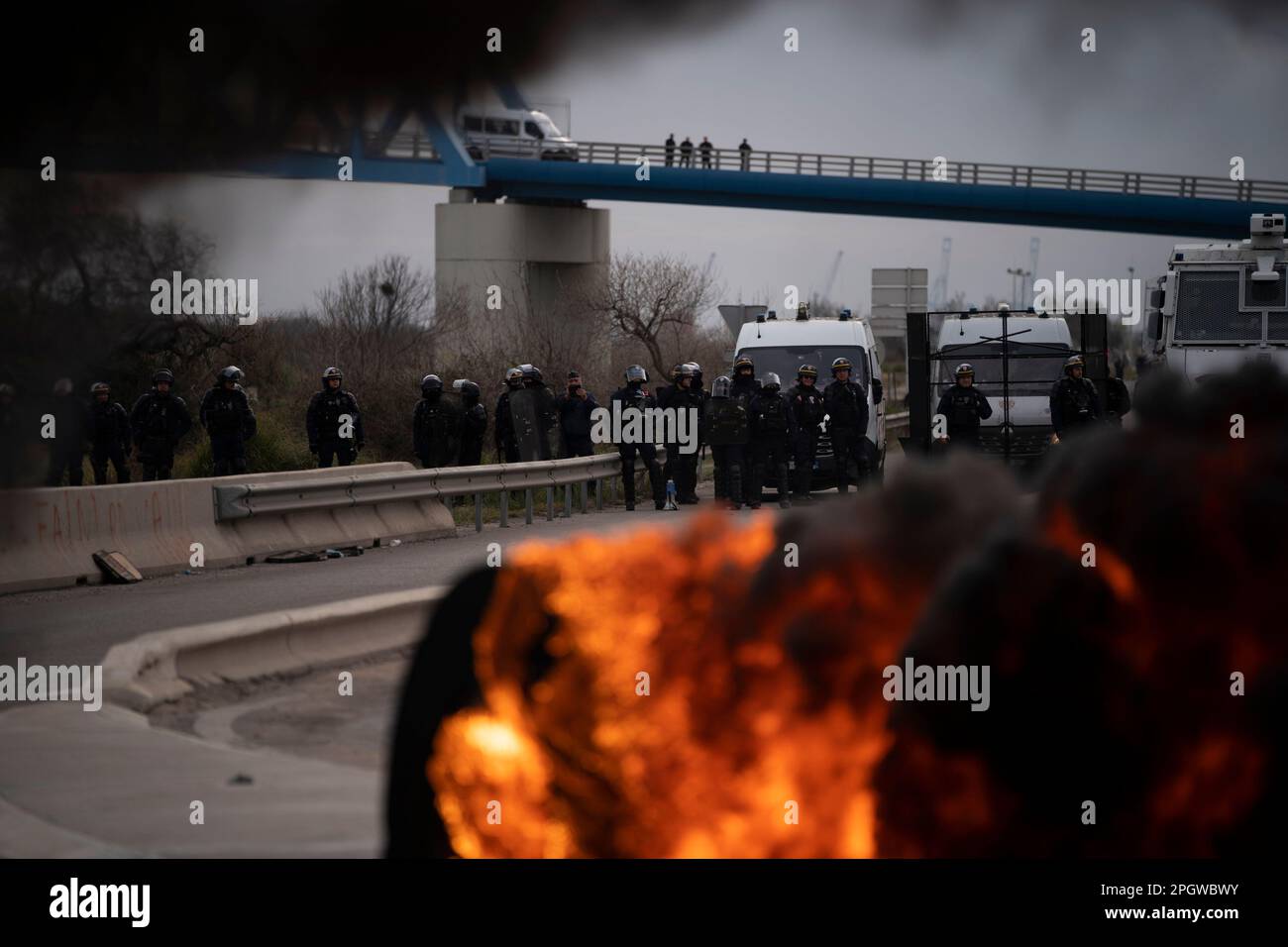 Riot police stand at the entrance of an oil depot in Fos-sur-Mer ...