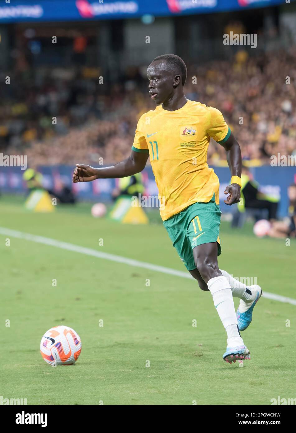 Sydney, Australia. 24th Mar, 2023. Awer Mabil of Australia National Men's soccer team in action during the 'Welcome Home' soccer match between Australia and Ecuador at the CommBank Stadium. Final score: 3:1 Australia : Ecuador. Credit: SOPA Images Limited/Alamy Live News Stock Photo