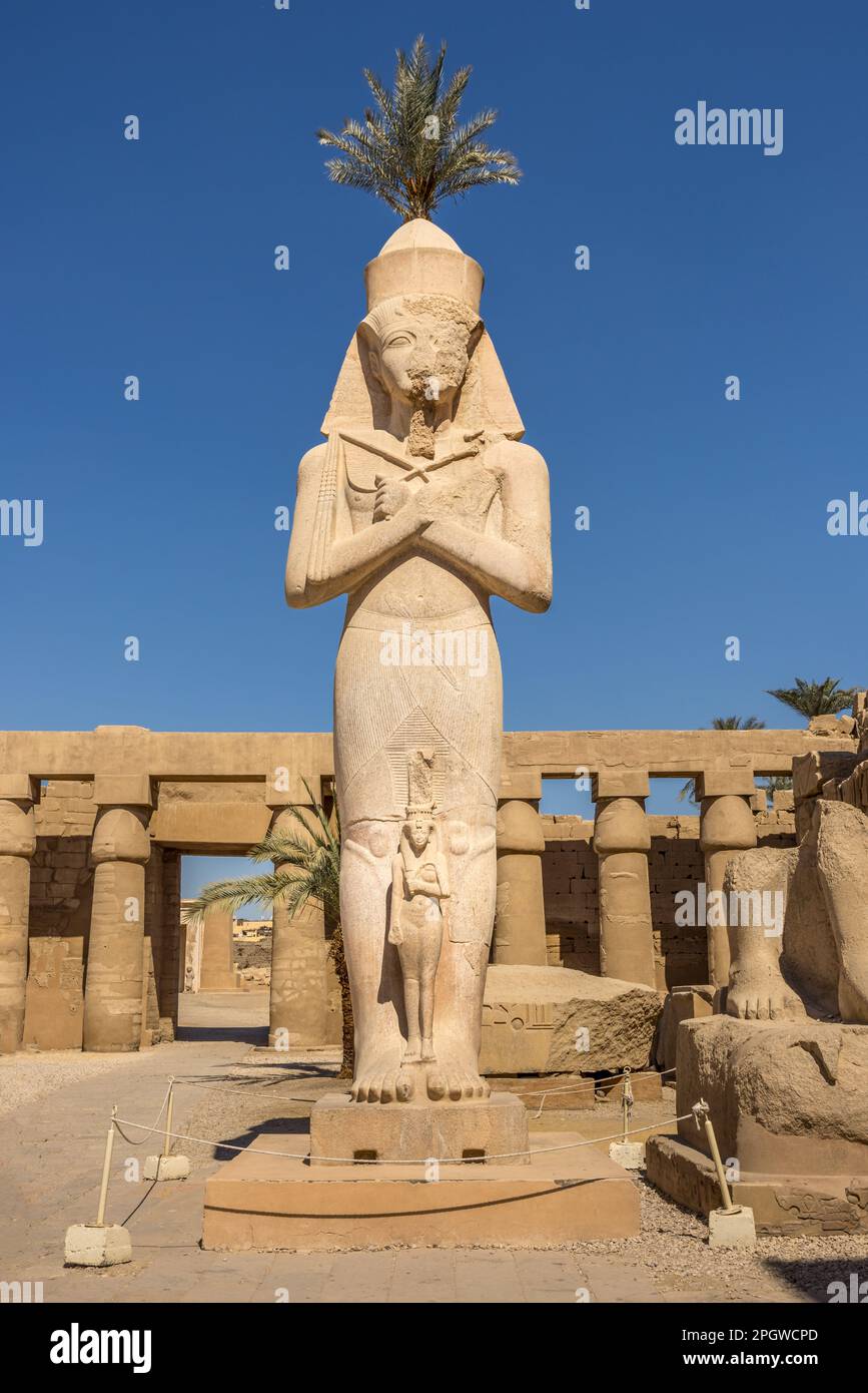 Statue of pharaoh Ramses II in the Karnak temple, Luxor Egypt Stock ...