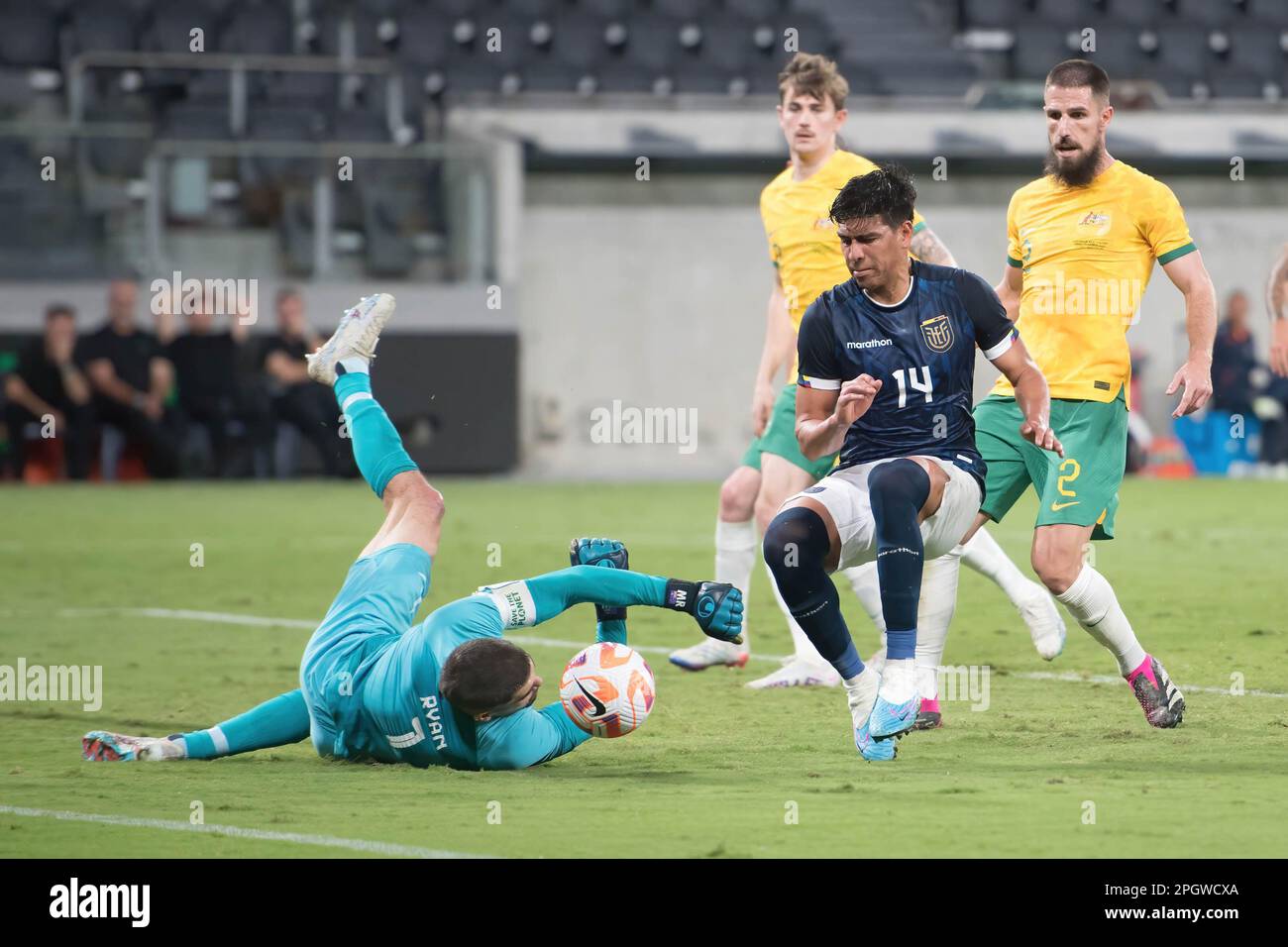 Sydney, Australia. 24th Mar, 2023. Mathew Ryan (L) of Australia National Men's soccer team and Xavier Arreaga (R) of Ecuador National Men's soccer team in action during the 'Welcome Home' soccer match between Australia and Ecuador at the CommBank Stadium. Final score: 3:1 Australia : Ecuador. Credit: SOPA Images Limited/Alamy Live News Stock Photo