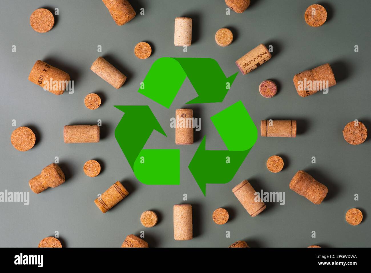 Recycling symbol and wine cork for secondary use. Preservation of the