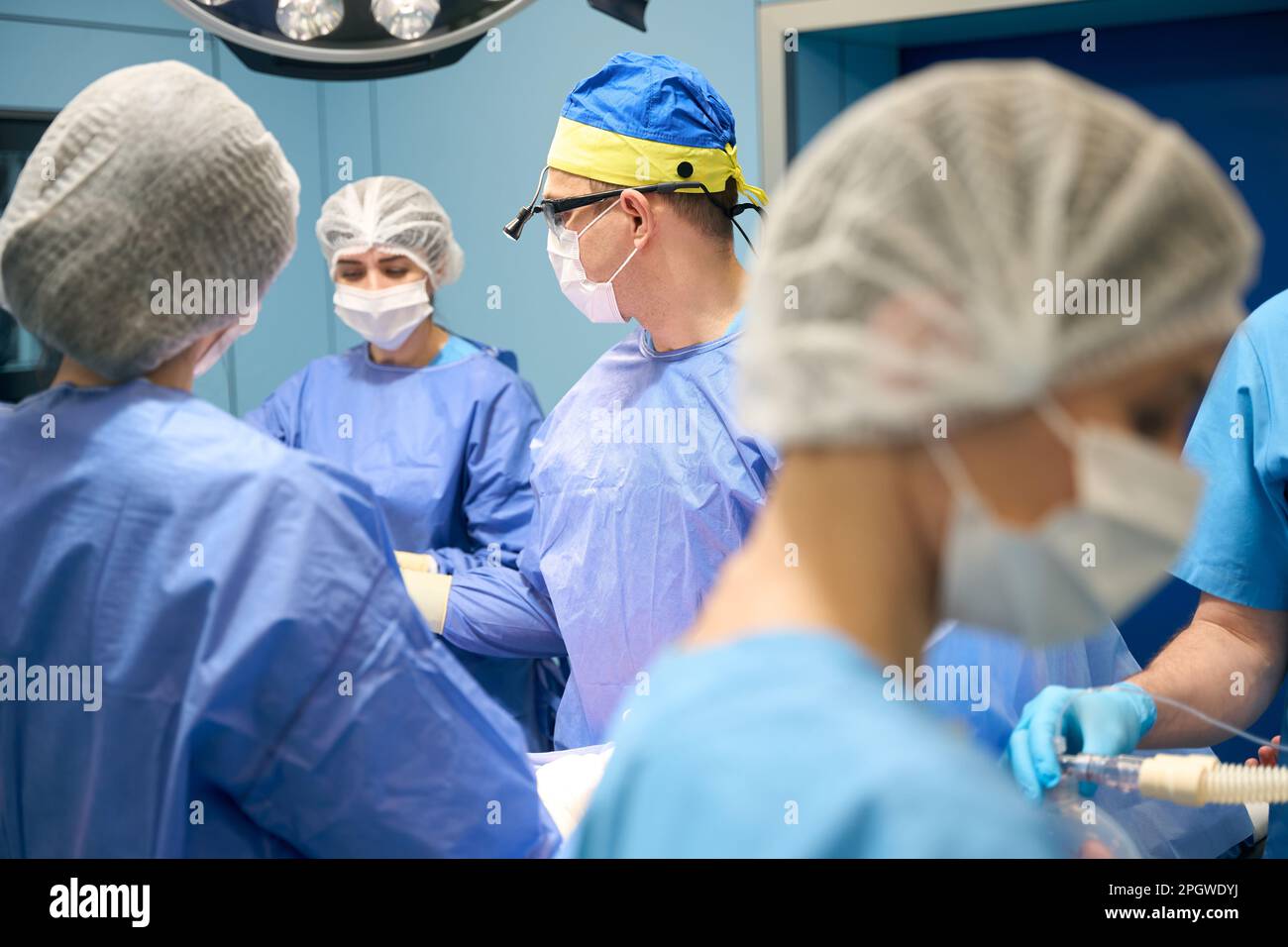 Surgeons perform operation patient in hi-res stock photography and ...