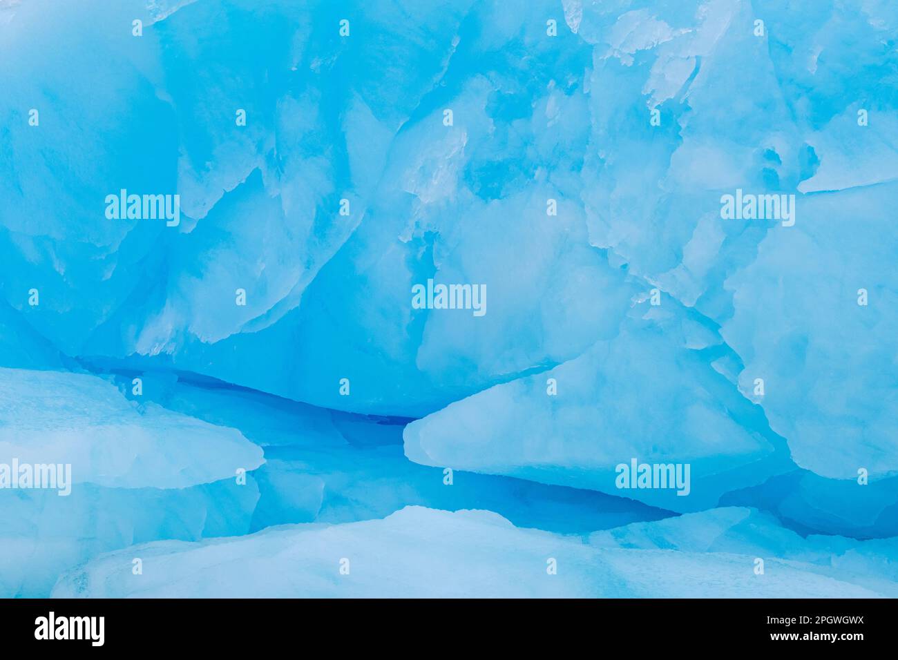 Blue ice abstract close-up of the Negribreen glacier at Spitsbergen, Svalbard Stock Photo