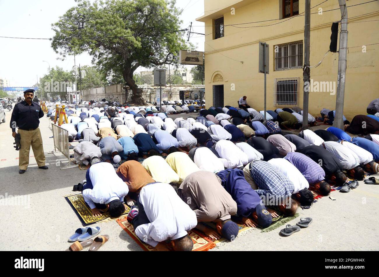 Faithfull Muslims are performing first Friday Prayer during the Holy ...