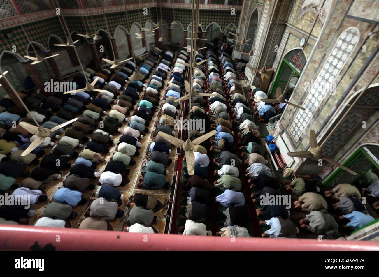 Faithfull Muslims are performing first Friday Prayer during the Holy ...