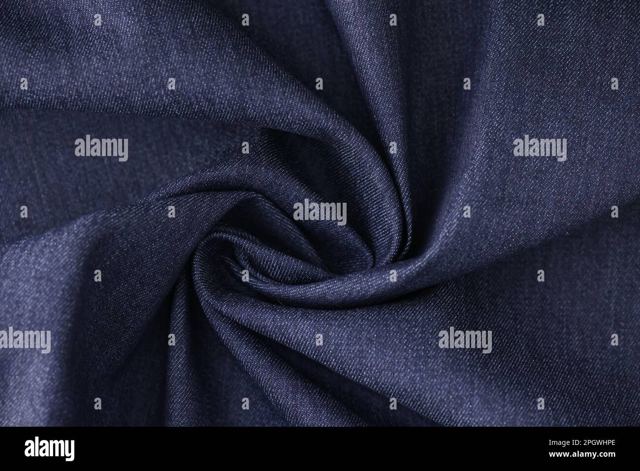Dark blue dense fabric for suits sewing upper view Stock Photo