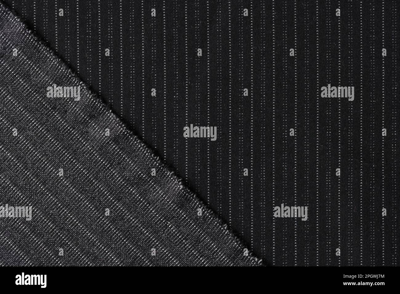 Black woolen fabric with dotted lines for formal clothes Stock Photo