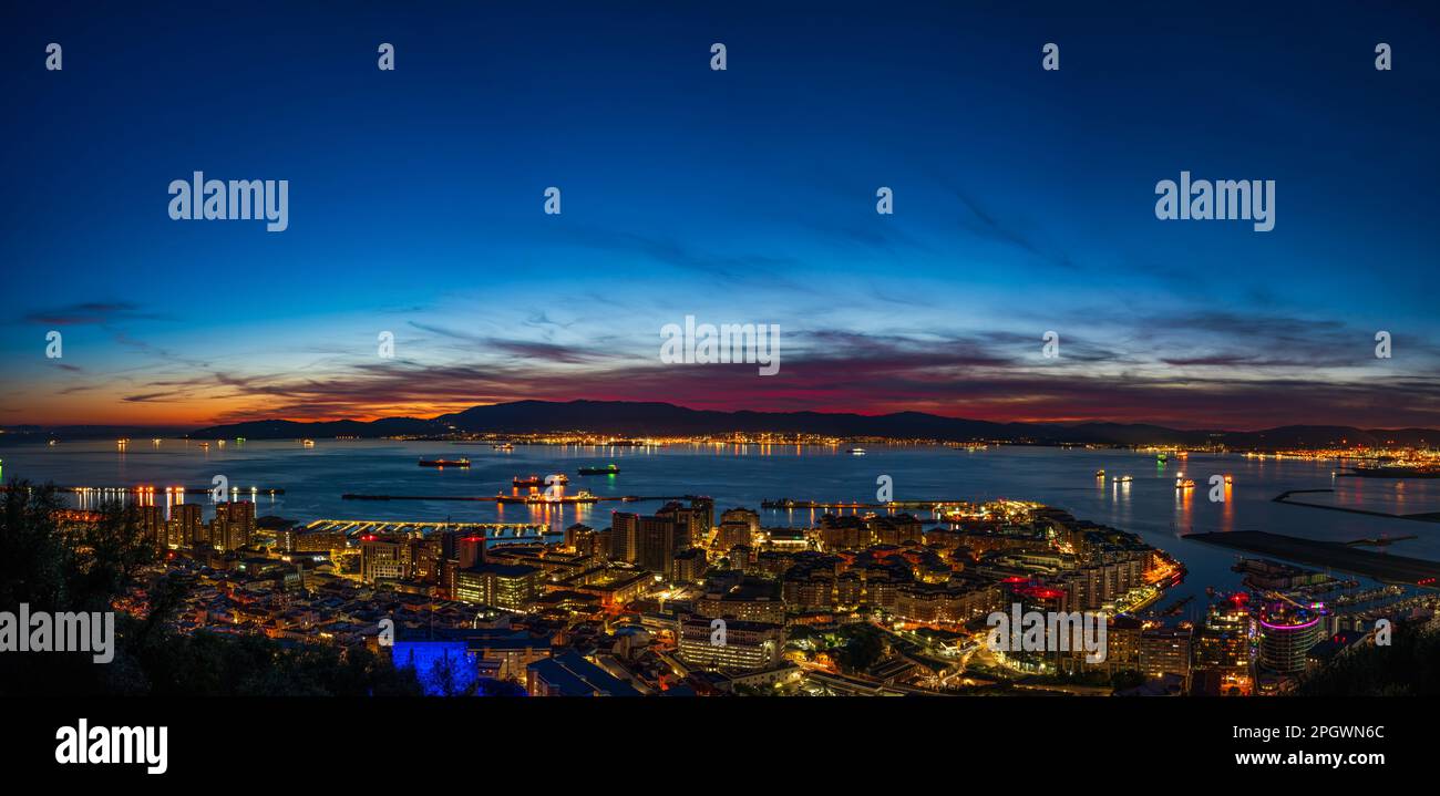 Sunset view over Gibraltar - a British Overseas Territory, and Bay of Gibraltar Stock Photo