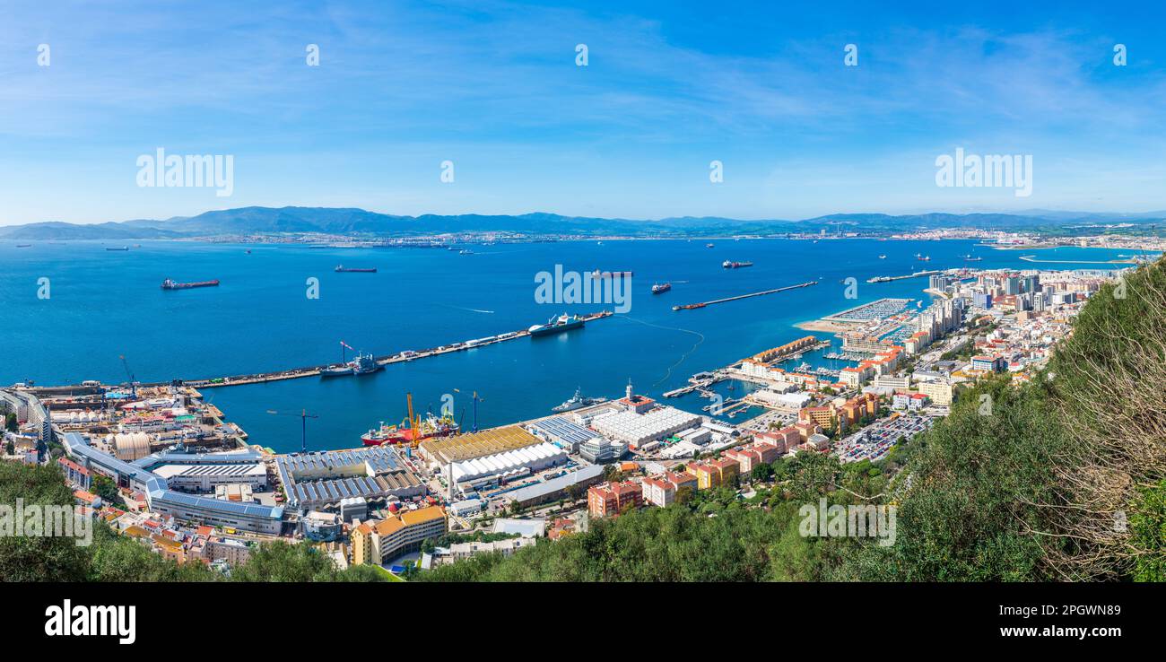 Panoramic  view over Gibraltar - a British Overseas Territory, and Spain across Bay of Gibraltar Stock Photo