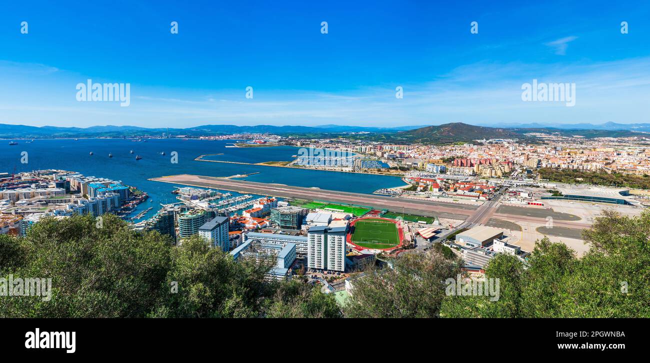 Panoramic  view over Gibraltar - a British Overseas Territory, and Spanish town of La Líinea de la Concepcion on Bay of Gibraltar Stock Photo