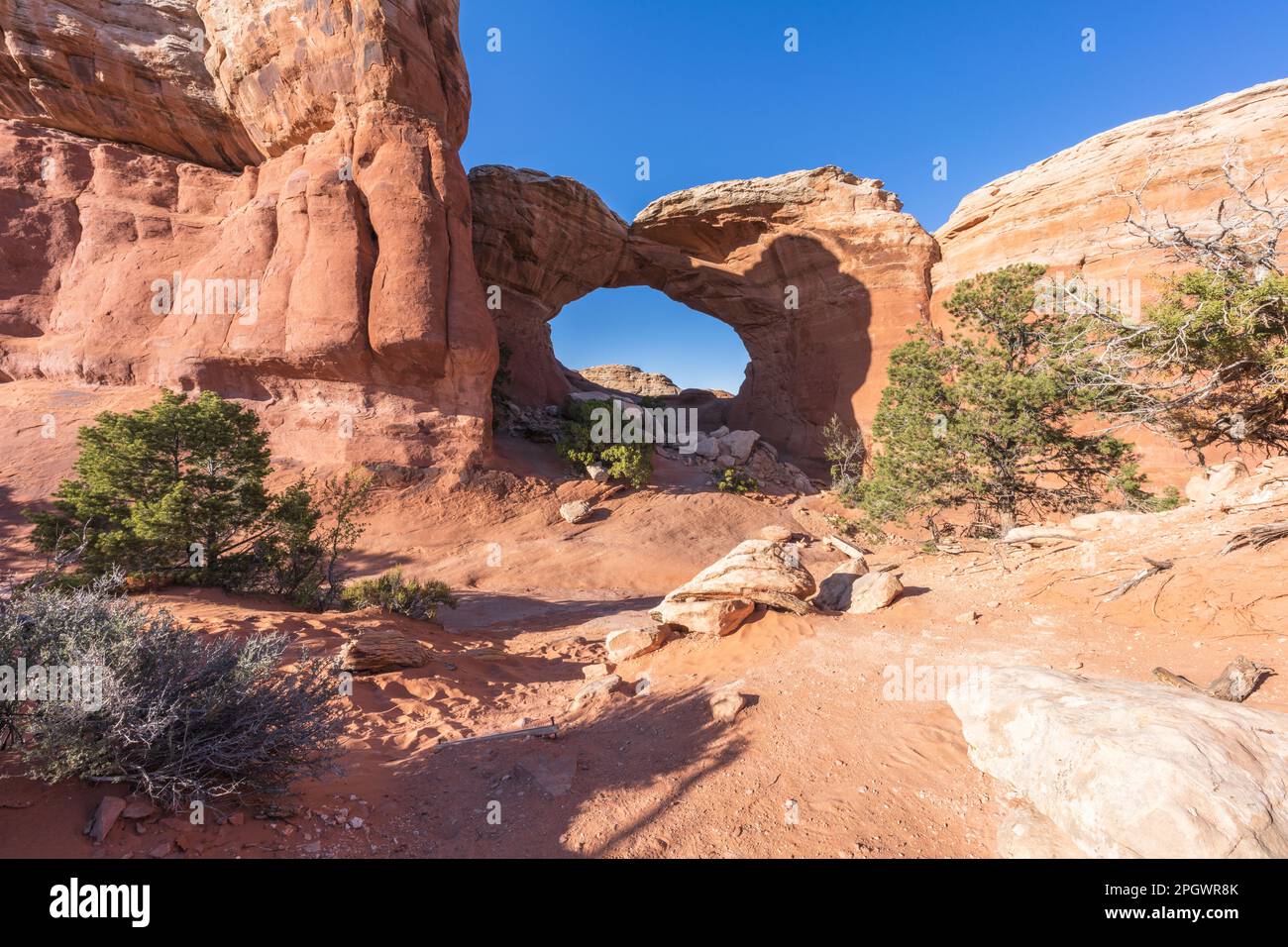 hiking the broken arch trail in arches national park in utah, usa Stock
