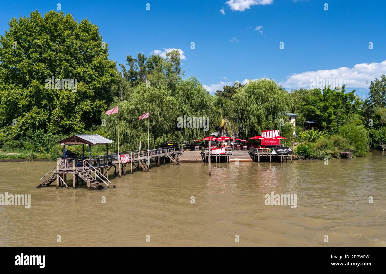 Tigre, Argentina - 7 February 2023: Brahma bar and restaurant landing stage and tables on Parana Delta Stock Photo