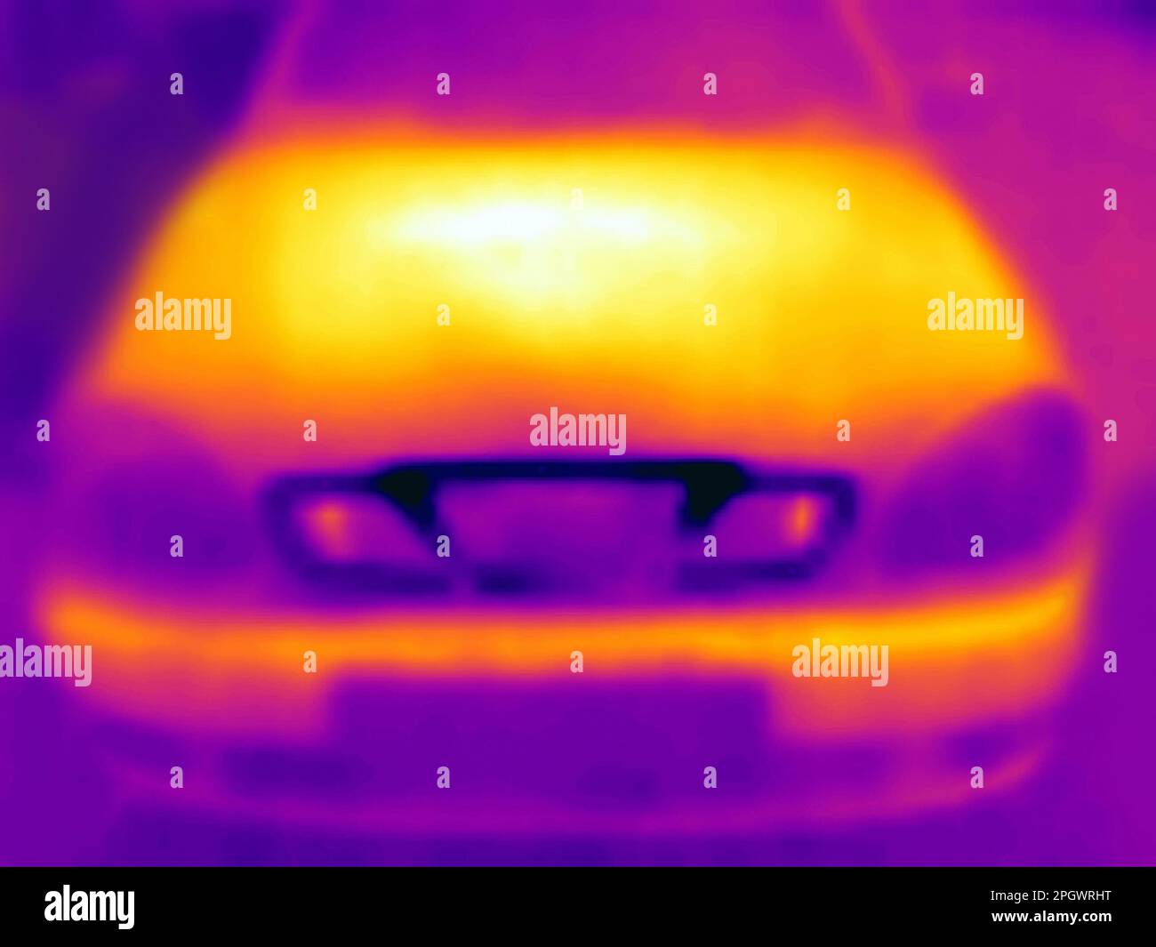 An ordinary car captured on thermal imager. The hood of a car that
