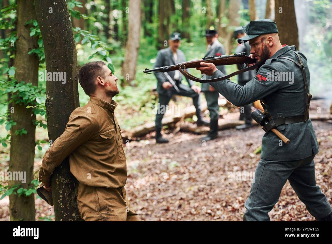 TERNOPIL, UKRAINE - June 2020 UPA Ukrainian Insurgent Army movie filming. Pictures of backstage. Interrogation of the hostage that tied to the tree Stock Photo