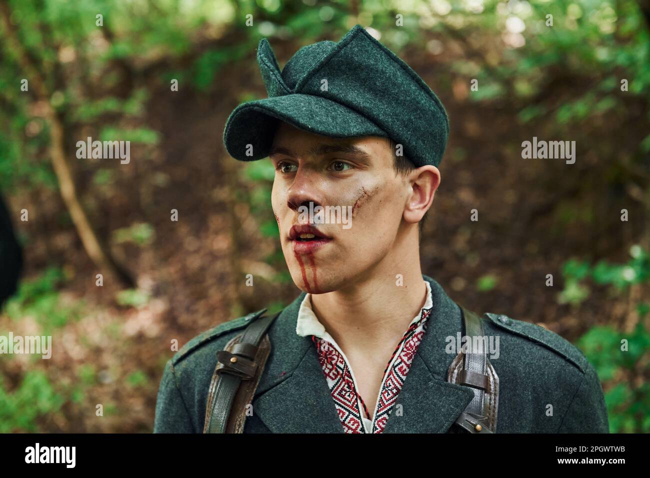 TERNOPIL, UKRAINE - June 2020 UPA Ukrainian Insurgent Army movie filming. Pictures of backstage. Young man with blood on face Stock Photo