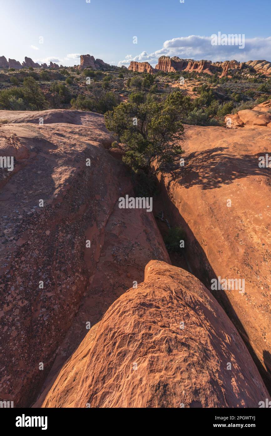 hiking the broken arch trail in arches national park in utah, usa Stock