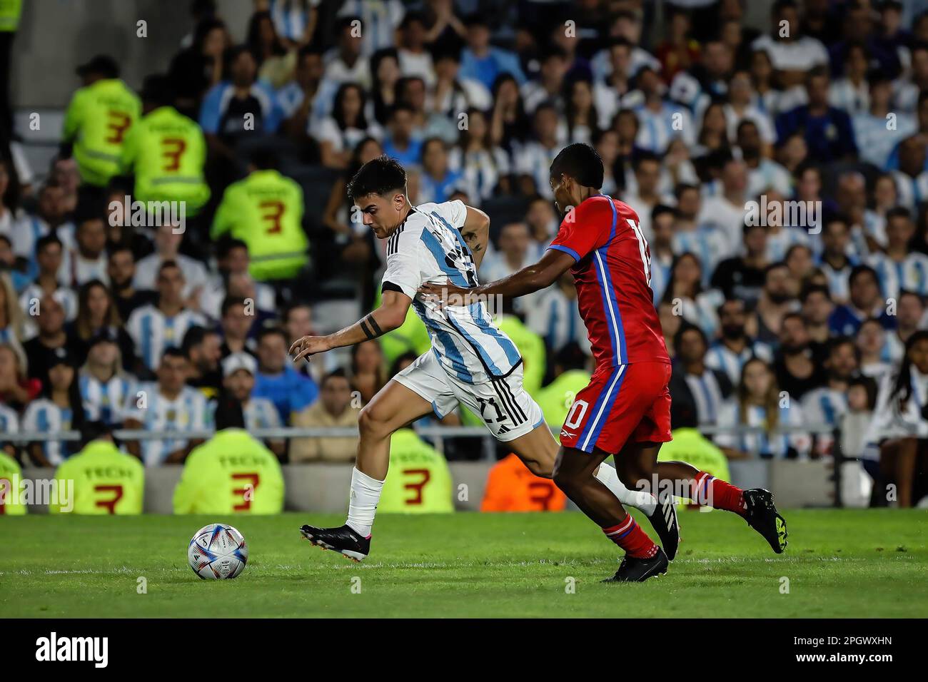 Paulo Dybala of Argentina and Miguel Camargo of Panama seen in action during the match between Argentina vs Panama as part of International Friendly Match at Mas Monumental Stadium. Final score: Argentina 2 - 0 Panama Stock Photo