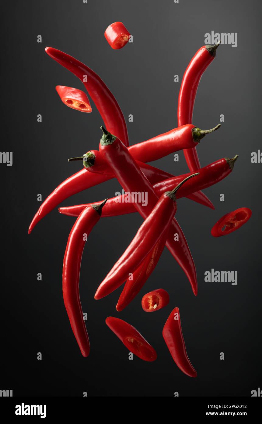 Red hot chili pepper falling hi-res stock photography and images - Alamy