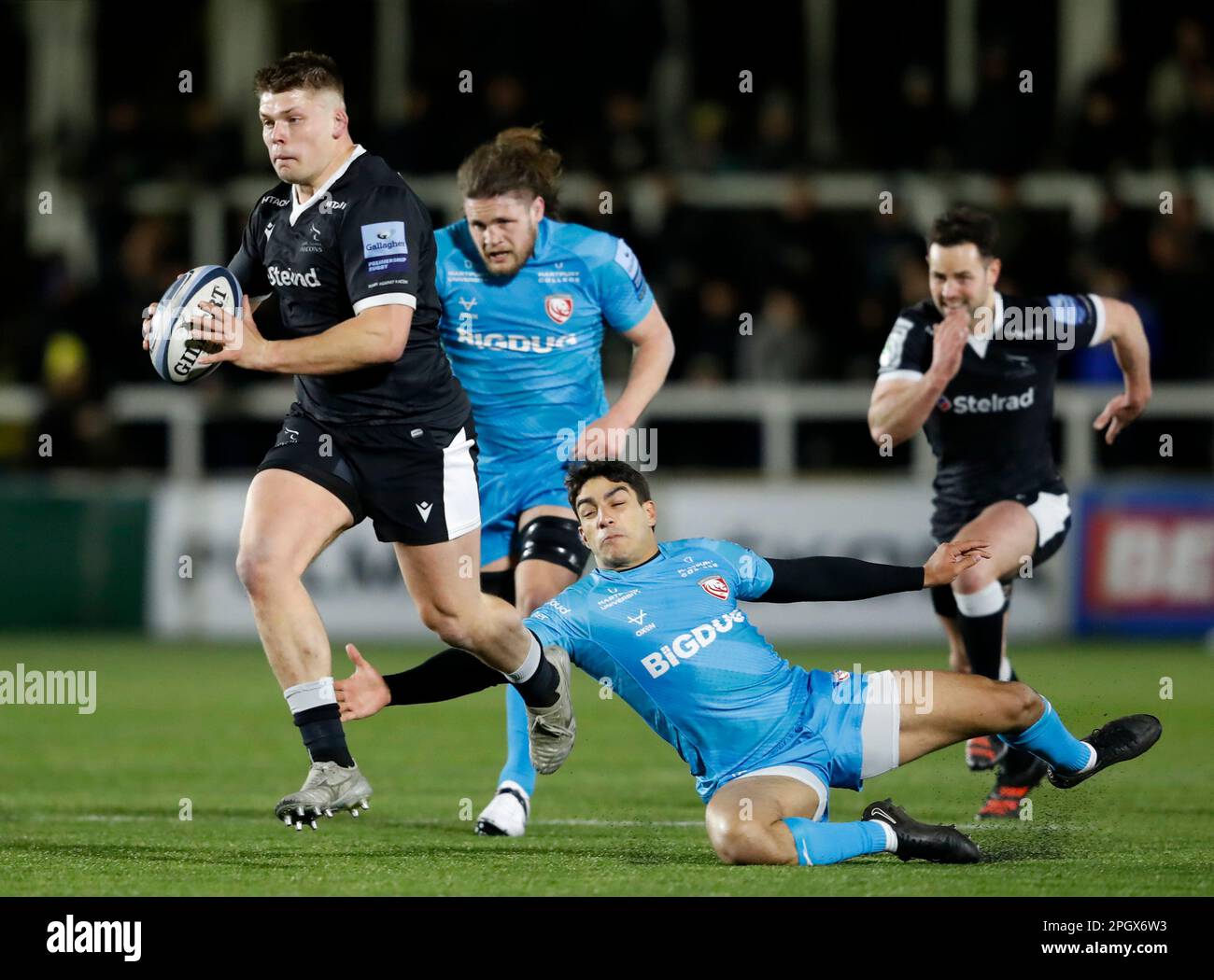 Newcastle Falcons' Jamie Blamire (left) and Gloucester's Santiago Carreras in action during the Gallagher Premiership match at Kingston Park, Newcastle upon Tyne. Picture date: Friday March 24, 2023. Stock Photo