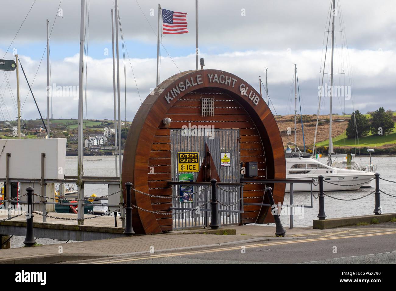 19 March 2023 The ornate wooden entrance to the Kinsale Yacht Club moorings on the main street of the tourist town of Kinsale near the southernmost ti Stock Photo