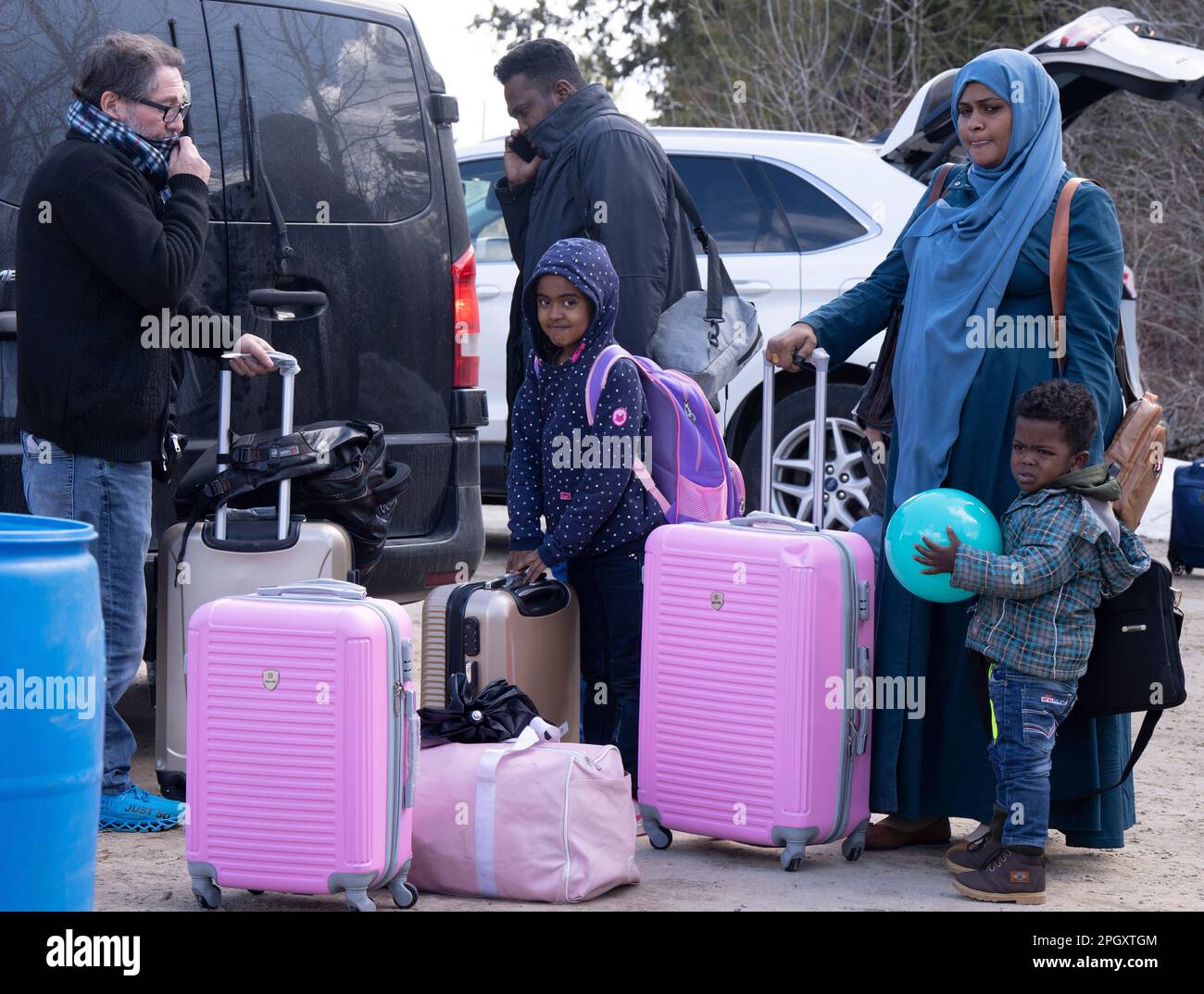 Champlain, United States. 24th Mar, 2023. A family of asylum seekers