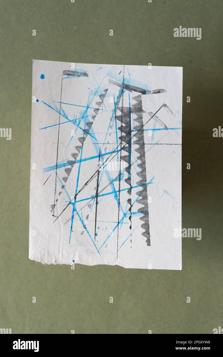 isolated note paper with lines and patterns on green Stock Photo