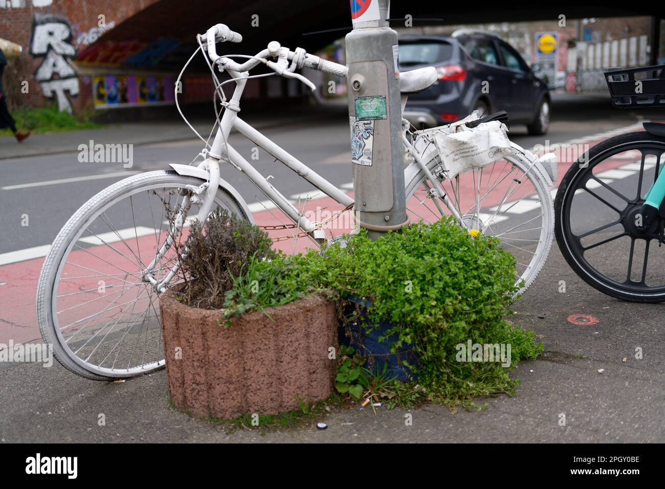 Cologne, Germany March 22, 2023: Ghost Bike roadside memorial to a cyclist killed on the road in cologne ehrenfeld Stock Photo