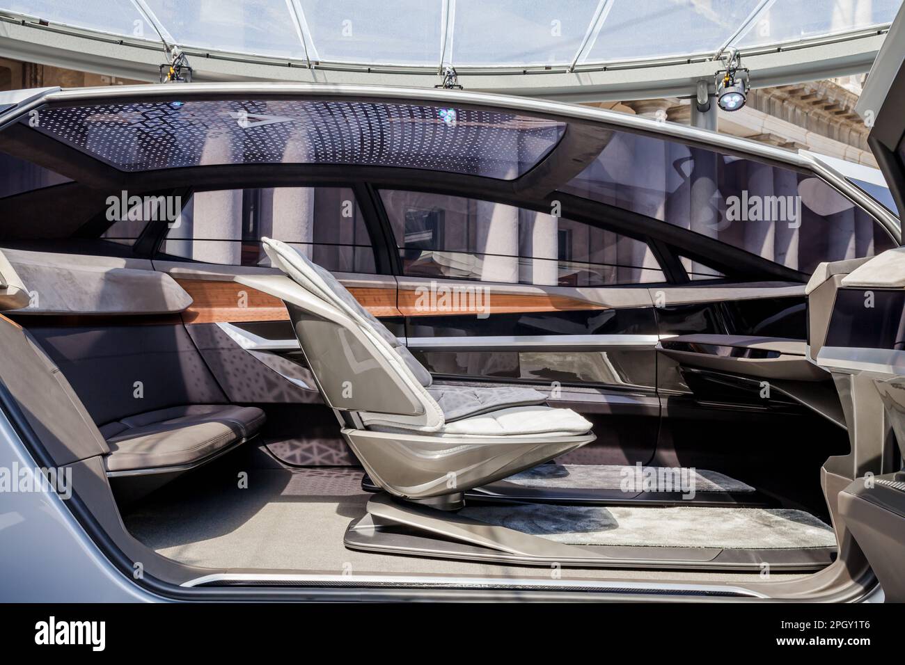 Interior view of white Audi Aicon concept car, self-driving luxury sedan with electric propulsion scheme. Stock Photo