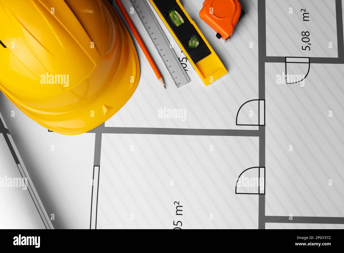 Construction drawing and different tools, above view Stock Photo