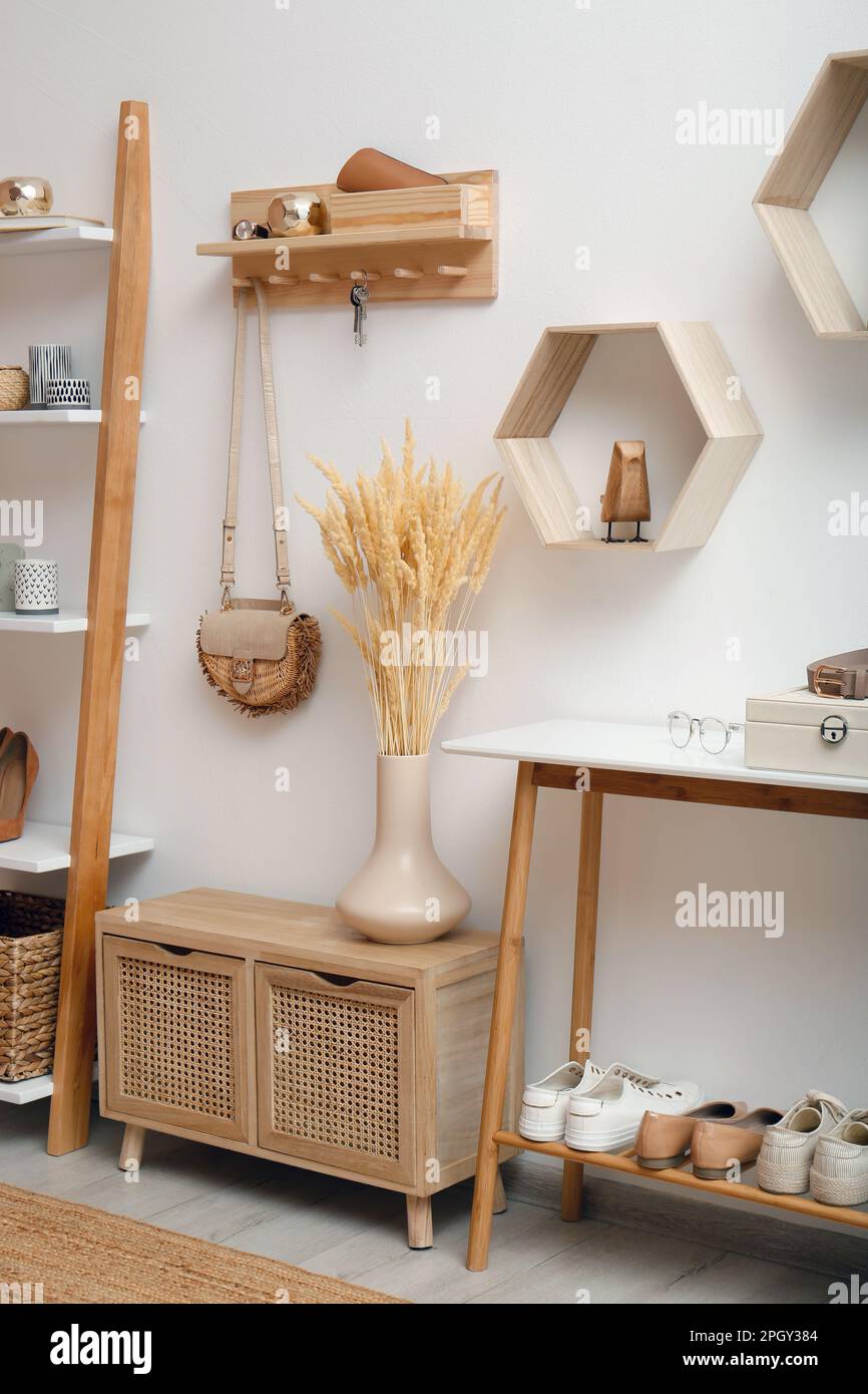 Stylish hanger for keys on white wall in hallway Stock Photo Alamy