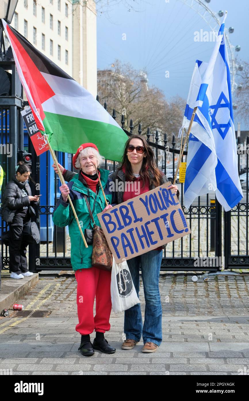 London, UK. 24th March, 2023. Protests were staged opposite Downing Street in Whitehall before and during Israeli Prime Minister Benjamin Netanyahu's visit to 10 Downing Street. Two main protest groups consisted of British-Israelis against controversial judicial reform policies, and pro-Palestinians concerned about the civil rights and oppression of its citizens. A much smaller group later arrived in support of Netanyahu. Credit: Eleventh Hour Photography/Alamy Live News Stock Photo